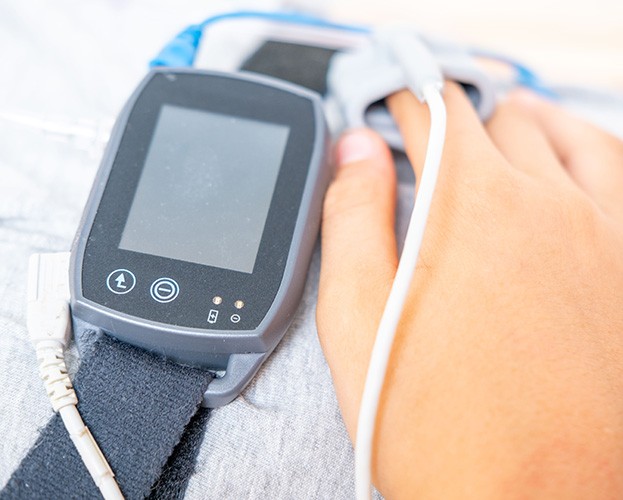 Close-up of sleep monitoring equipment attached to a patient