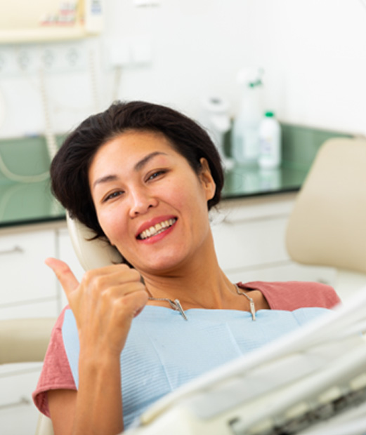 Female dental patient waiting for dental checkup and cleaning in North Providence, RI