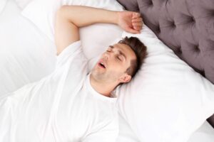 Man sleeping with his mouth open